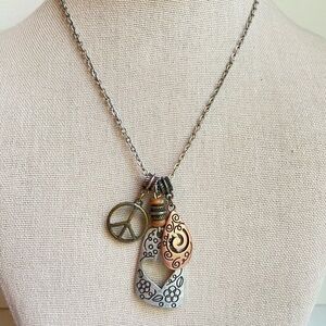 Lia Sophia Day Dreamer pendant necklace with peace and heart charms mixed metals
